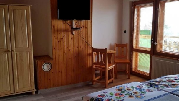 Dvojlôžková izba s balkónom na poschodí