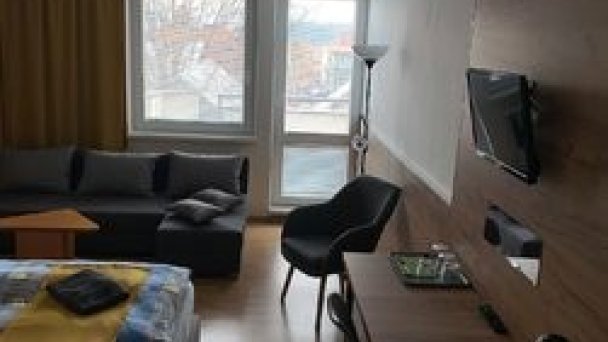 Izba s balkónom