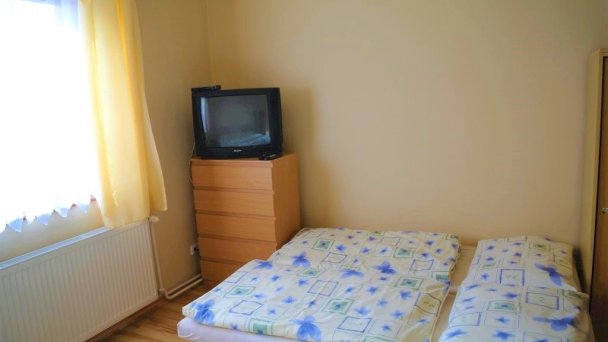 Štvorlôžková izba s manželskými posteľami (